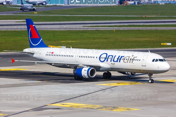 An Airbus A321 aircraft of Onur Air with registration TC-OEC at Warsaw Airport