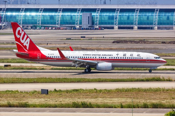 A China United Airlines CUA Boeing 737-800 aircraft with registration number B-1279 at Guangzhou Airport