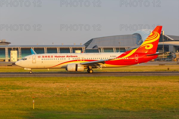 A Hainan Airlines Boeing 737-800 aircraft with registration number B-5083 at Guangzhou Airport