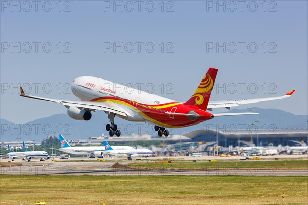 An Airbus A330-300 aircraft of Hainan Airlines with registration number B-1098 at Guangzhou airport