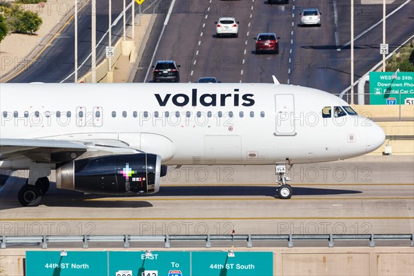 A Volaris Airbus A320 aircraft with registration XA-VLX at Phoenix Airport