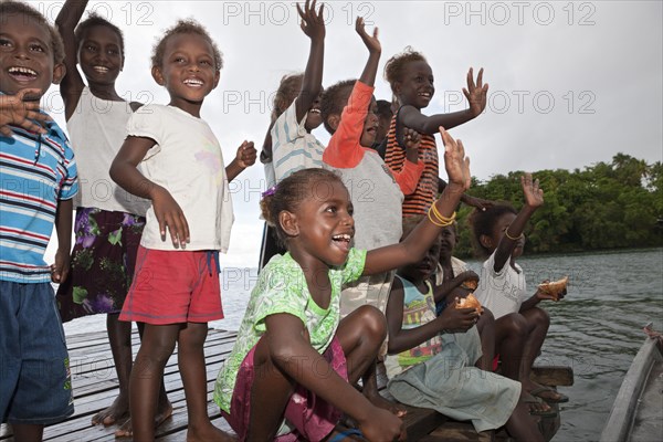 Telina Island locals greet visitors