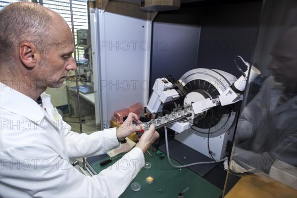 Scientific assistant at the X-ray apparatus during his research work