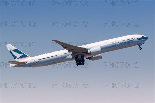 A Cathay Pacific Boeing 777-300ER aircraft with registration B-KPA at Hong Kong Airport