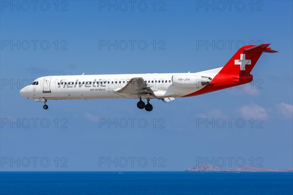 A Fokker 100 of Helvetic Airways with registration HB-JVH at Heraklion Airport