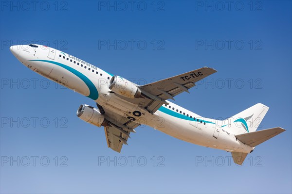 A Boeing 737-400 aircraft of Tailwind Airlines with registration TC-TLC at Tel Aviv Airport