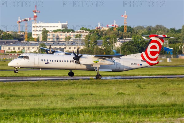 A Bombardier DHC-8-400 of LOT Polskie Linie Lotnicze with registration SP-EQG at Warsaw Airport