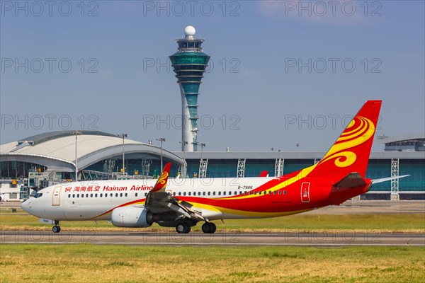 A Hainan Airlines Boeing 737-800 aircraft with registration number B-7886 at Guangzhou Airport