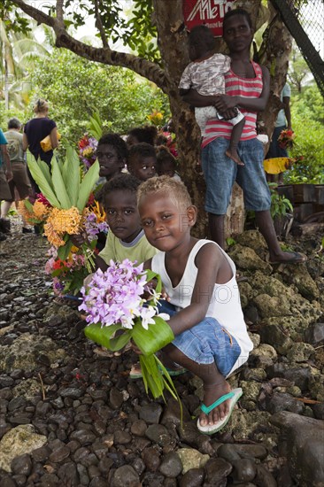 Telina Island locals greet visitors