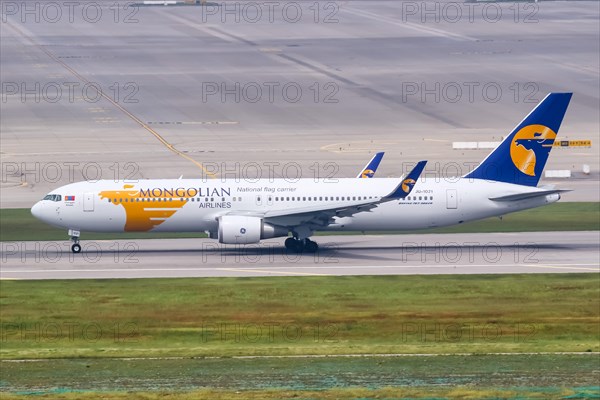 A Mongolian Airlines Boeing 767-300ER with registration number JU-1021 at Seoul Incheon International Airport