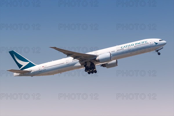 A Cathay Pacific Boeing 777-300ER aircraft with registration B-KQD at Hong Kong Airport