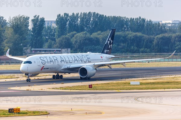 An Air China A350-900 aircraft with registration B-308M and European Starling Alliance special livery at Beijing Airport