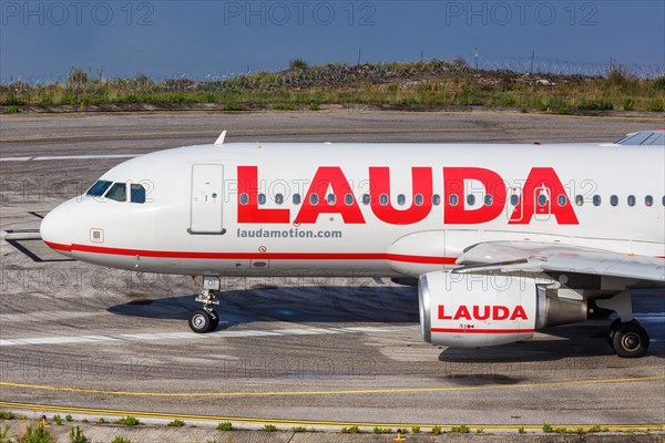 A Lauda Airbus A320 aircraft with registration number OE-LOI at Corfu Airport