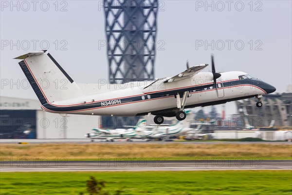 A Bombardier DHC-8-200 aircraft with registration N349PH at Bogota Airport