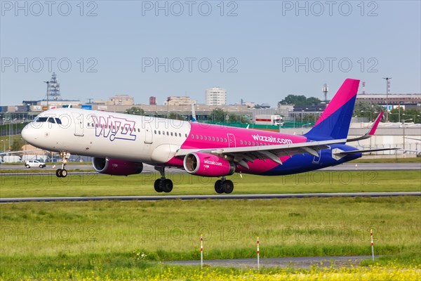 An Airbus A321 aircraft of Wizzair with registration number HA-LXR at Warsaw Airport