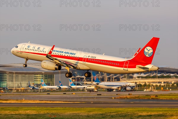 An Airbus A321 aircraft of Sichuan Airlines with registration number B-302S at Guangzhou airport