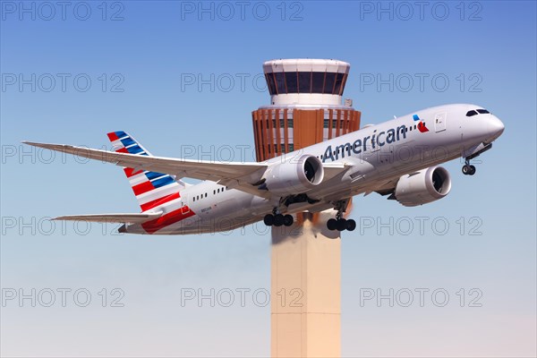 An American Airlines Boeing 787-8 Dreamliner aircraft with registration number N802AN takes off from Phoenix Airport