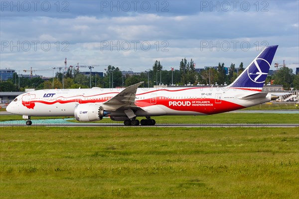 A Boeing 787-9 Dreamliner aircraft of LOT Polskie Linie Lotnicze with registration SP-LSC at Warsaw Airport