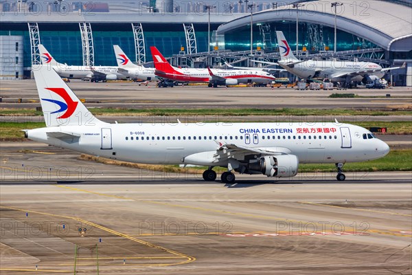 An Airbus A320 aircraft of China Eastern Airlines with registration number B-6008 at Guangzhou airport