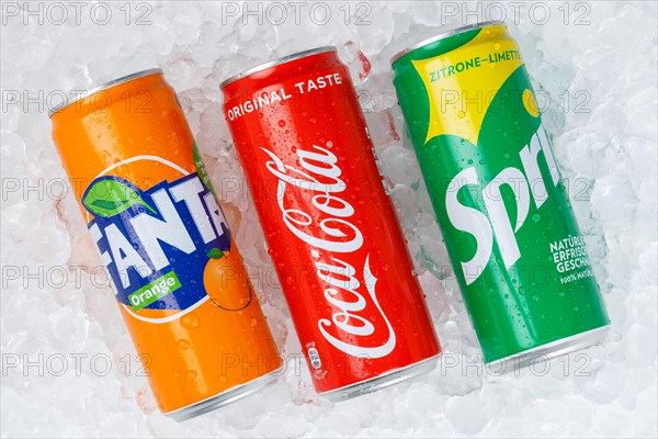 Coca Cola Coca-Cola products Fanta Sprite lemonade soft drink drinks in can ice cube ice cubes against a white background in Germany