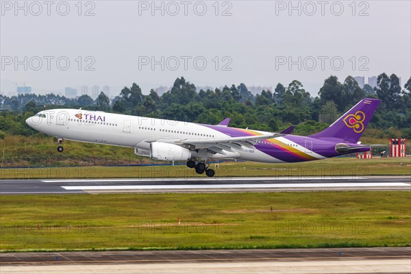 An Airbus A330-300 aircraft of Thai Airways International with registration number HS-TES at Chengdu Airport
