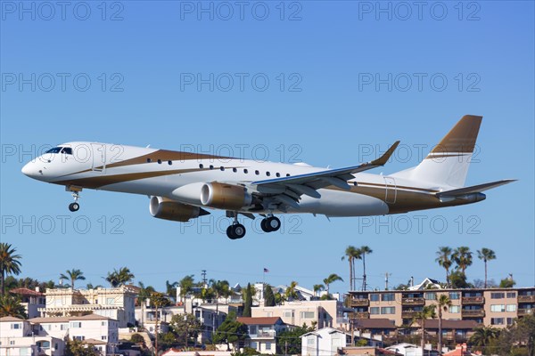 An Embraer Lineage 1000E aircraft with registration N783MM lands at San Diego Airport