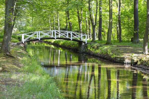 Bridge over the moat in the park of Hermsdorf Castle