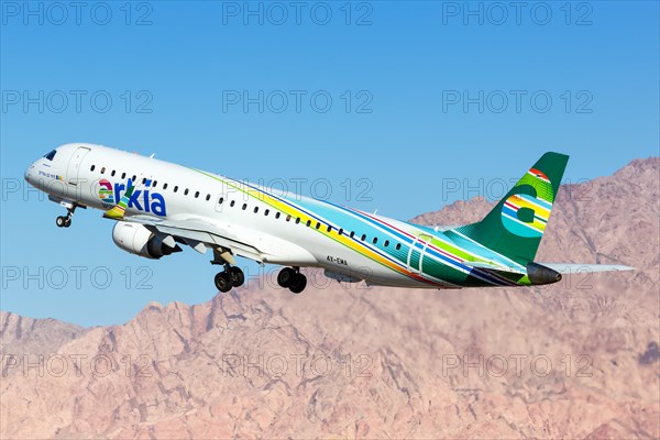 An Arkia Embraer 195 with registration 4X-EMA takes off from Eilat Airport