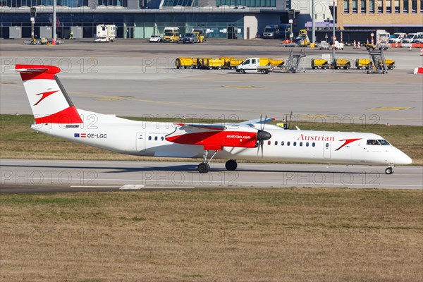 A Bombardier DHC-8-400 of Austrian Airlines with the registration OE-LGC at Stuttgart Airport