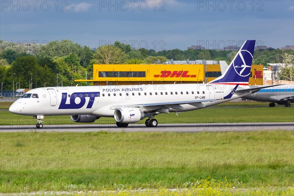 An Embraer 190 of LOT Polskie Linie Lotnicze with the registration SP-LMB at Warsaw Airport
