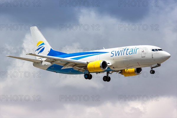 A Swiftair Boeing 737-300SF aircraft with registration number N811TJ lands at Miami Airport