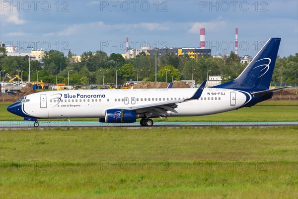 A Boeing 737-800 aircraft of Blue Panorama Airlines with registration number 9H-FSJ at Warsaw Airport