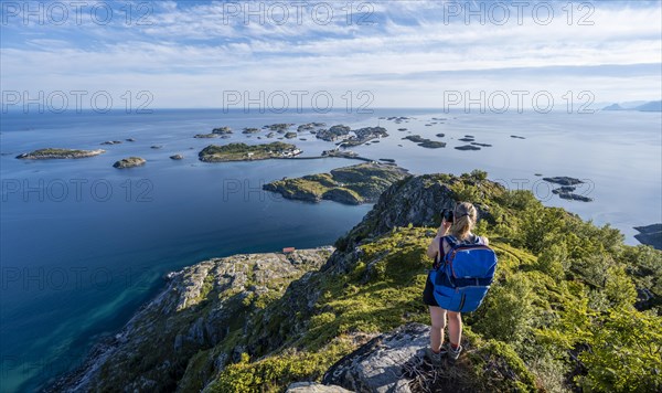 Houses on small rocky islands in the sea