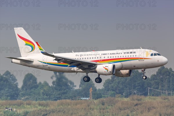 An Airbus A319 aircraft of Tibet Airlines with registration number B-6436 at Chengdu airport