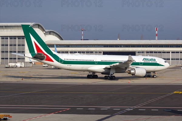 An Alitalia Airbus A330-200 with registration number EI-EJN at Malpensa airport in Milan