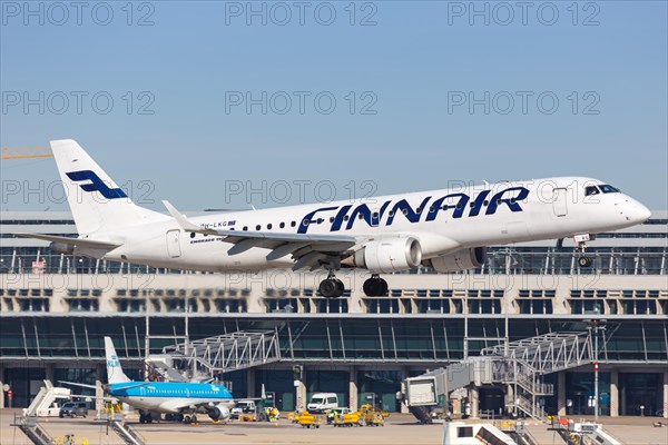 A Finnair Embraer ERJ190 with registration OH-LKG lands at Stuttgart Airport