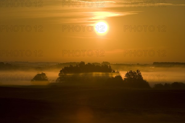 Sunrise with morning fog