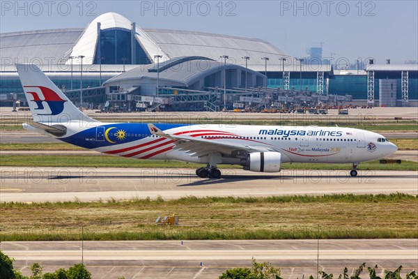 A Malaysia Airlines Airbus A330-200 aircraft with registration number 9M-MTX at Guangzhou Airport