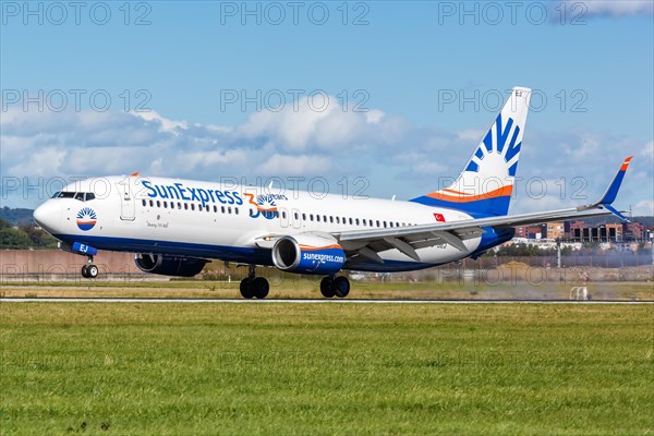 A Boeing 737-800 of SunExpress with the registration TC-SEJ at Stuttgart Airport