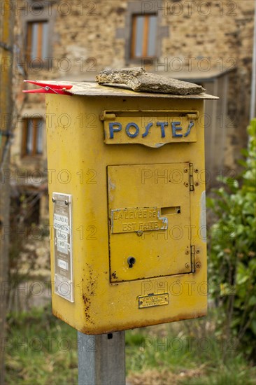 Old french metal postbox in countryside
