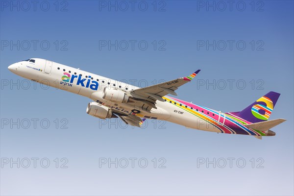 An Arkia Embraer 195 with the registration 4X-EMF takes off from Tel Aviv Airport