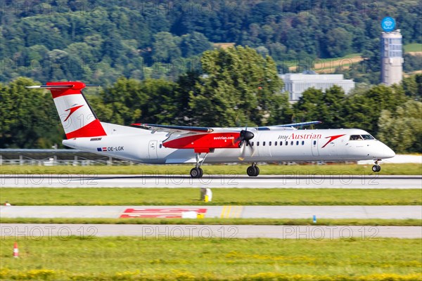 A Bombardier DHC-8-400 of Austrian Airlines with the registration OE-LGK at Stuttgart Airport