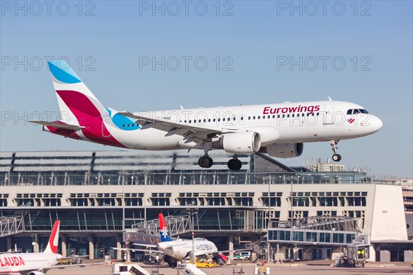 A Eurowings Airbus A320 with registration D-ABHC lands at Stuttgart Airport