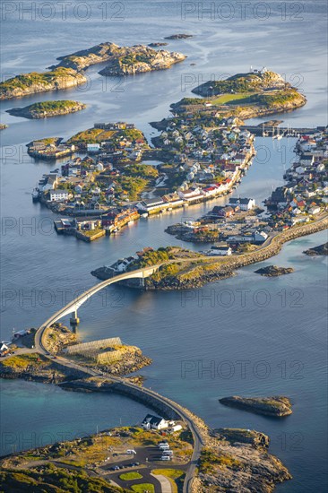 Houses on small rocky islands in the sea