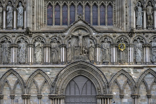 Entrance portal with holy figures