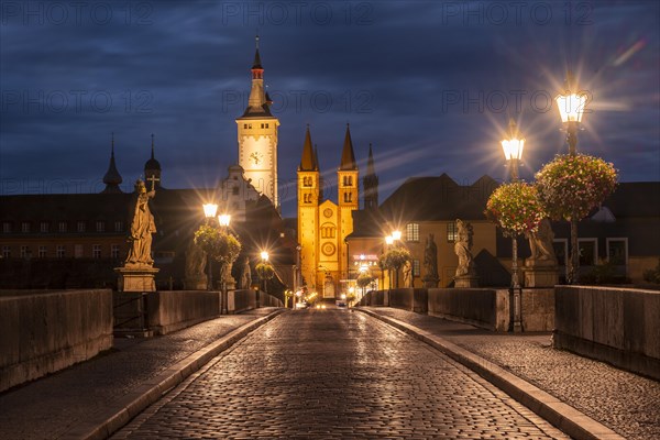 Old bridge over the river Main at dawn