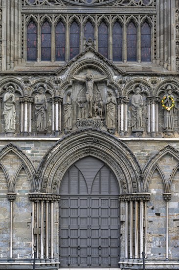 Entrance portal with holy figures