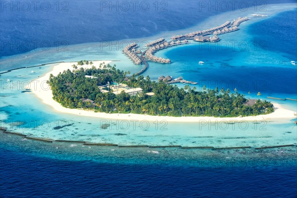 Island vacation paradise sea Halaveli Resort Ari Atoll aerial view tourism in Maldives