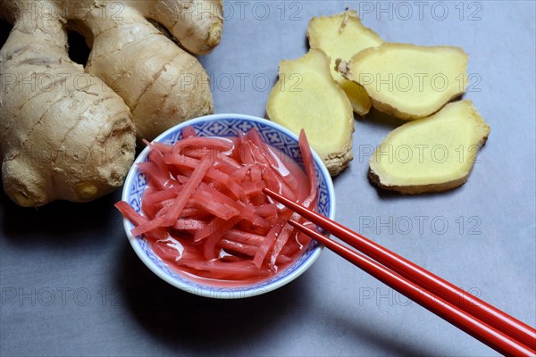 Pickled ginger in small bowls and ginger slices