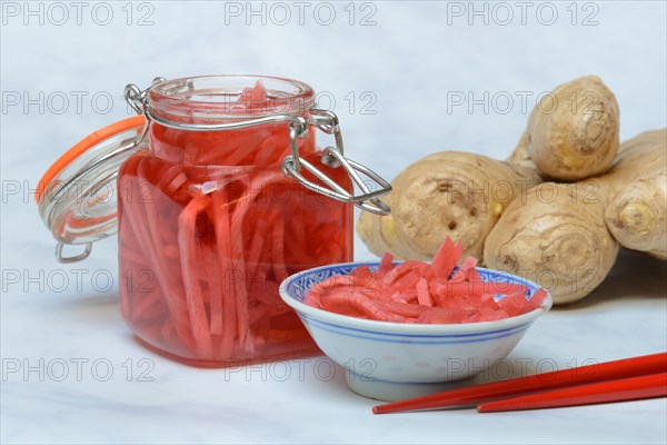 Pickled ginger in glass and peel